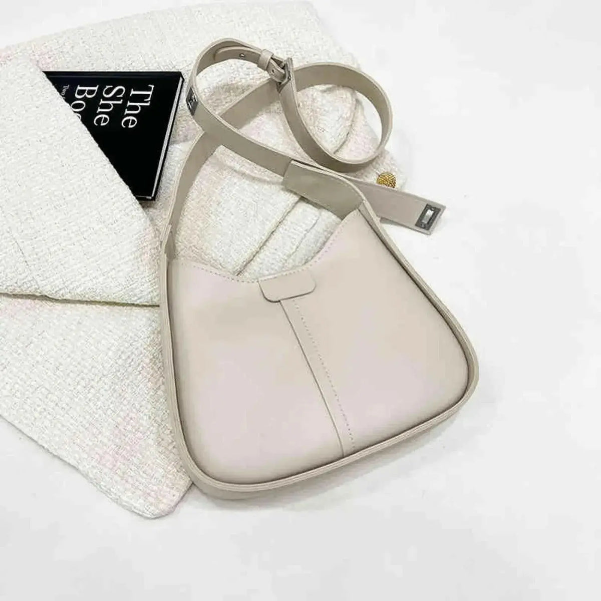 Women’s textured vegan leather crossbody handbag with versatile shoulder strap by Plush Fashion Hub, stylish and high-end design.