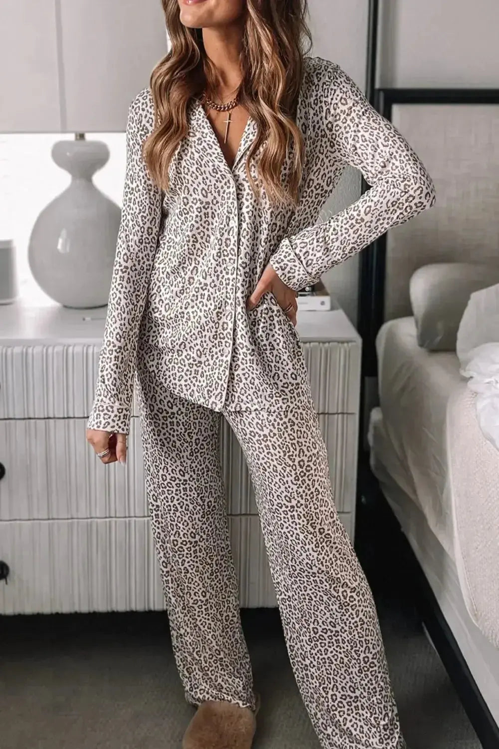 Women’s leopard print long sleeve button-down pajama lounge set by Plush Fashion Hub, featuring cozy, stylish pajama top and bottoms.