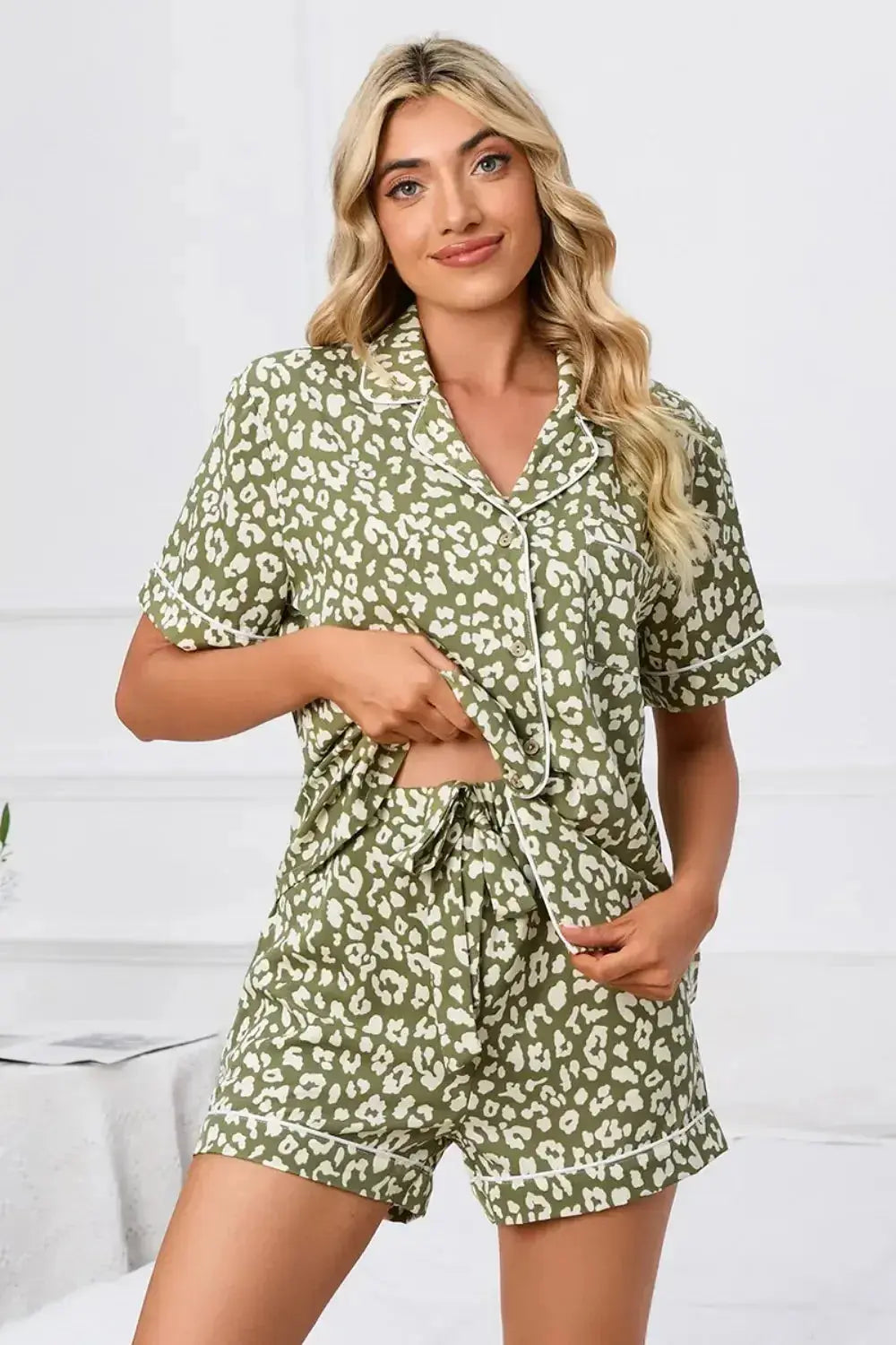 Women’s leopard print button-down short sleeve pajama lounge set by Plush Fashion Hub, featuring a stylish and comfortable pajama top and bottoms.