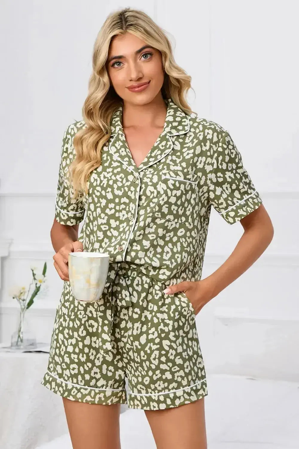 Women’s leopard print short sleeve pajama lounge set by Plush Fashion Hub, featuring button-down top and comfortable shorts.