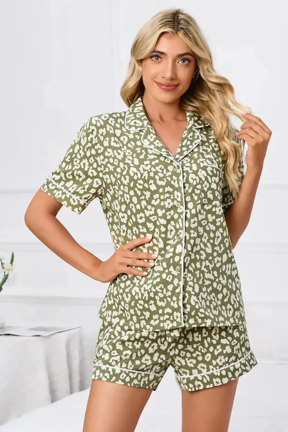 Women’s leopard print pajama lounge set with button-down short sleeves by Plush Fashion Hub, featuring a stylish and comfortable design.