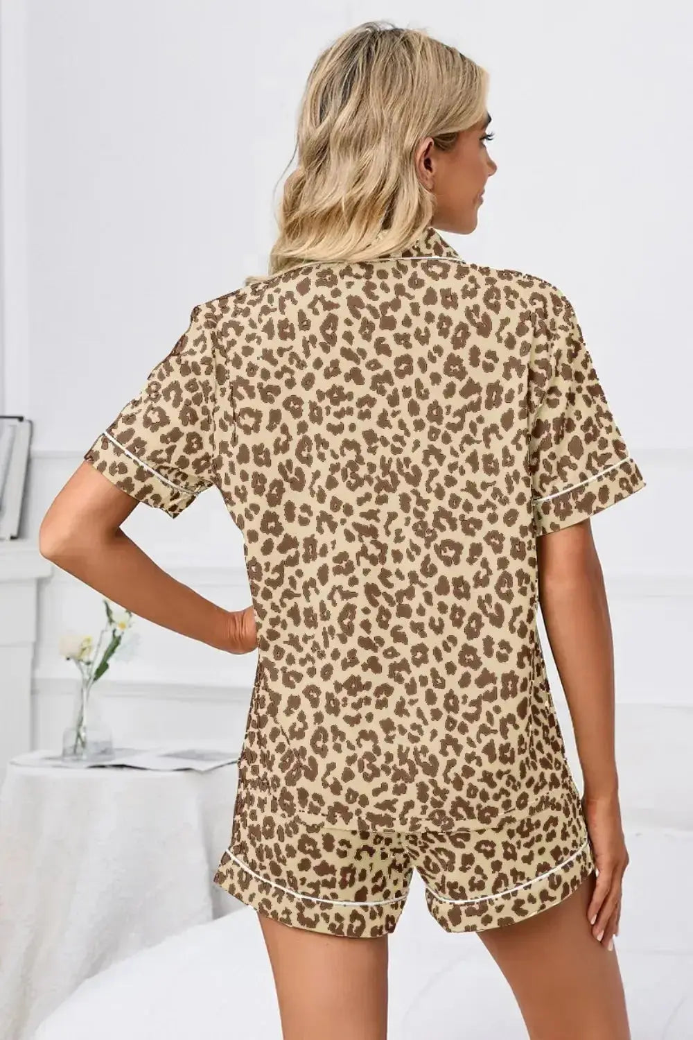 Women’s leopard print button-down short sleeve pajama lounge set by Plush Fashion Hub, featuring stylish and comfortable sleepwear.