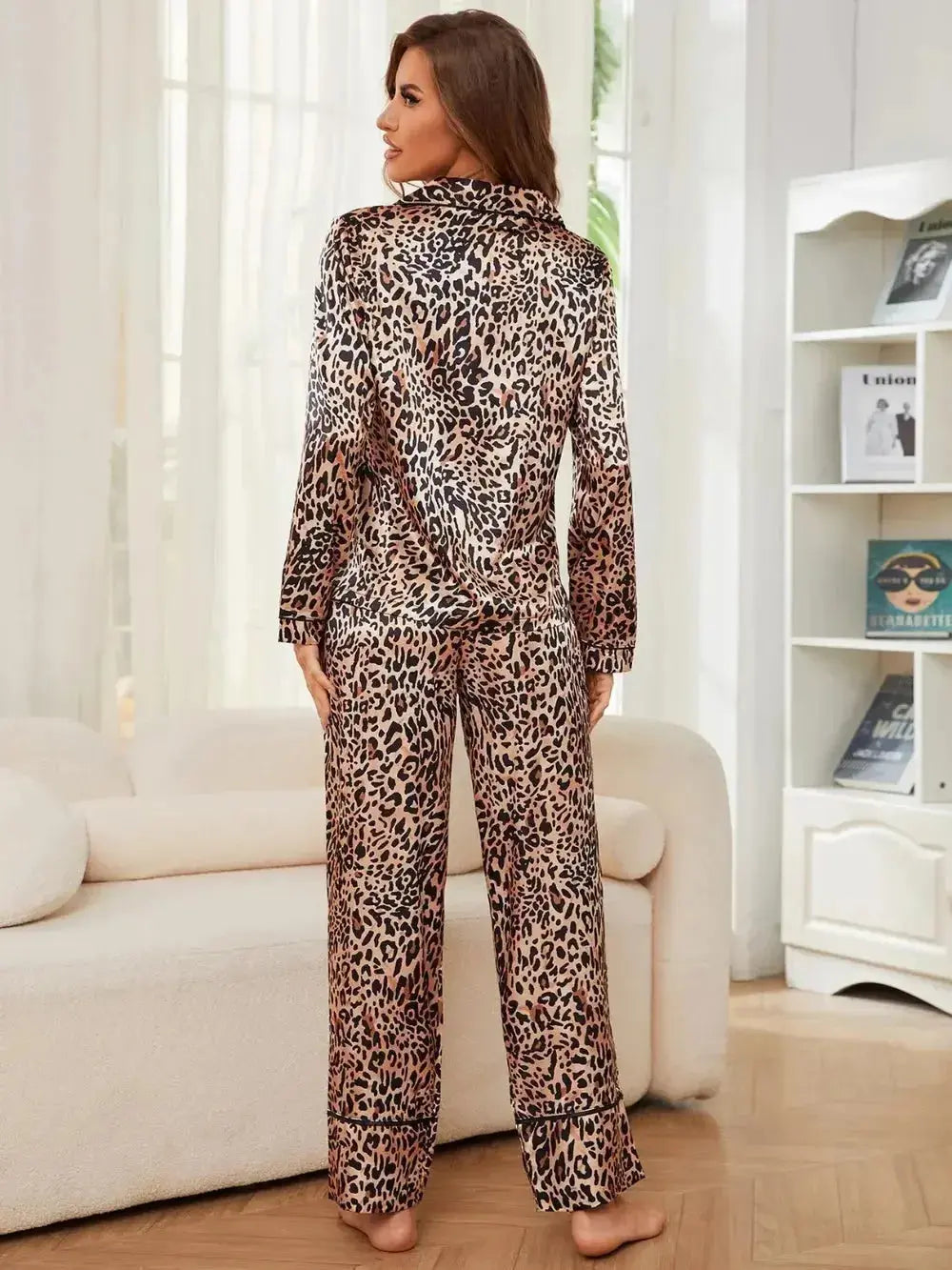 Women’s leopard print long sleeve pajama lounge set by Plush Fashion Hub, featuring button-up top and comfortable pajama bottoms.