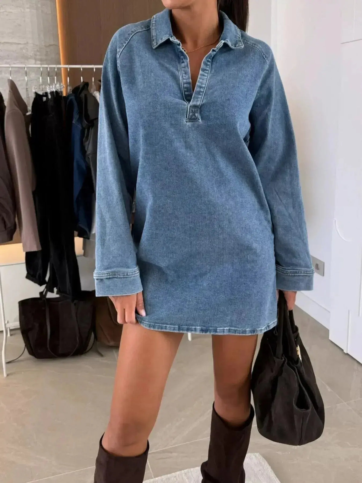 Women's long sleeve collared denim midi dress by Plush Fashion Hub, featuring a casual button-down style and classic denim fabric.