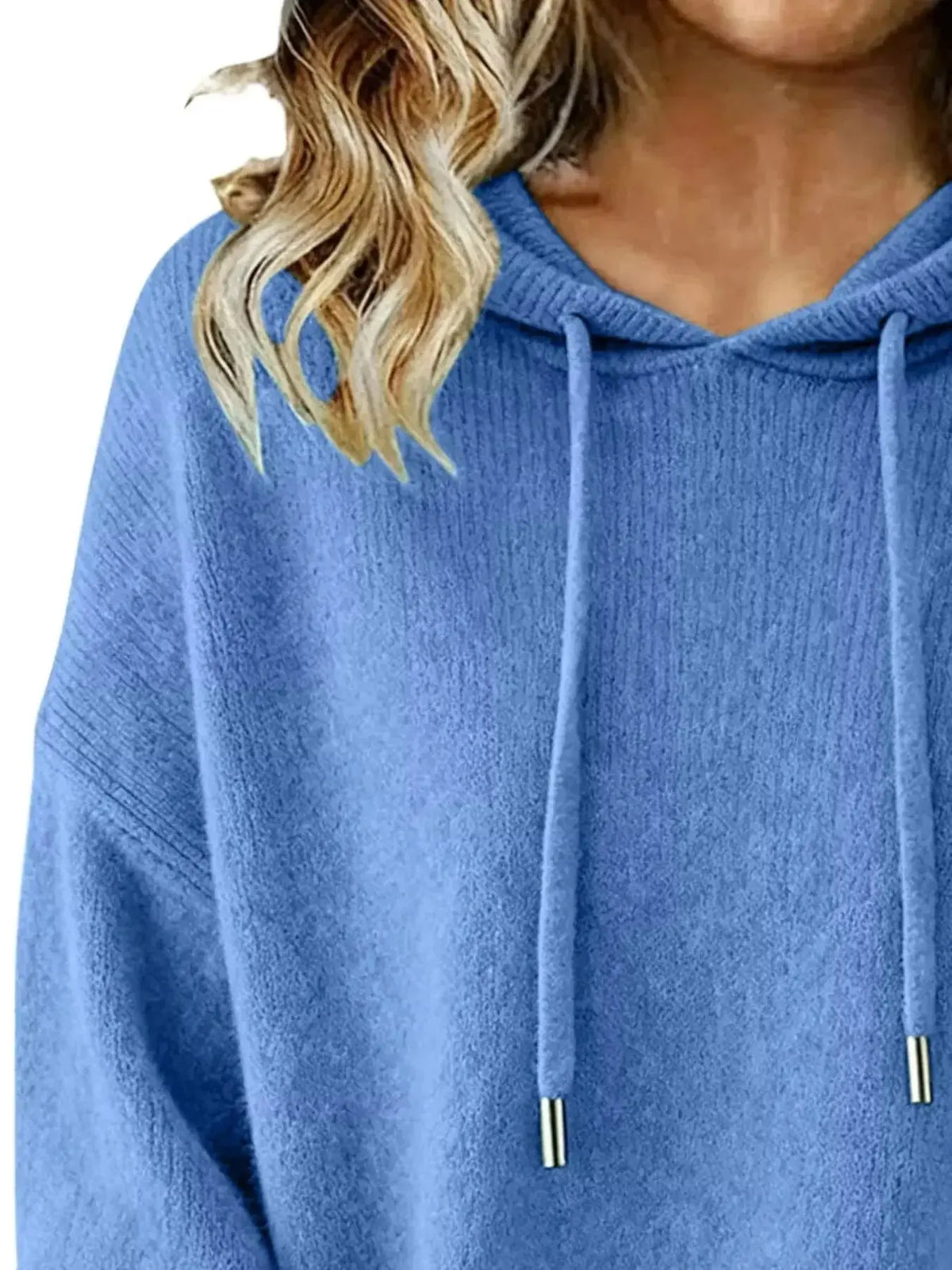 Women’s long sleeve drawstring hooded sweater by Plush Fashion Hub, cozy casual pullover with a relaxed fit and stylish design.