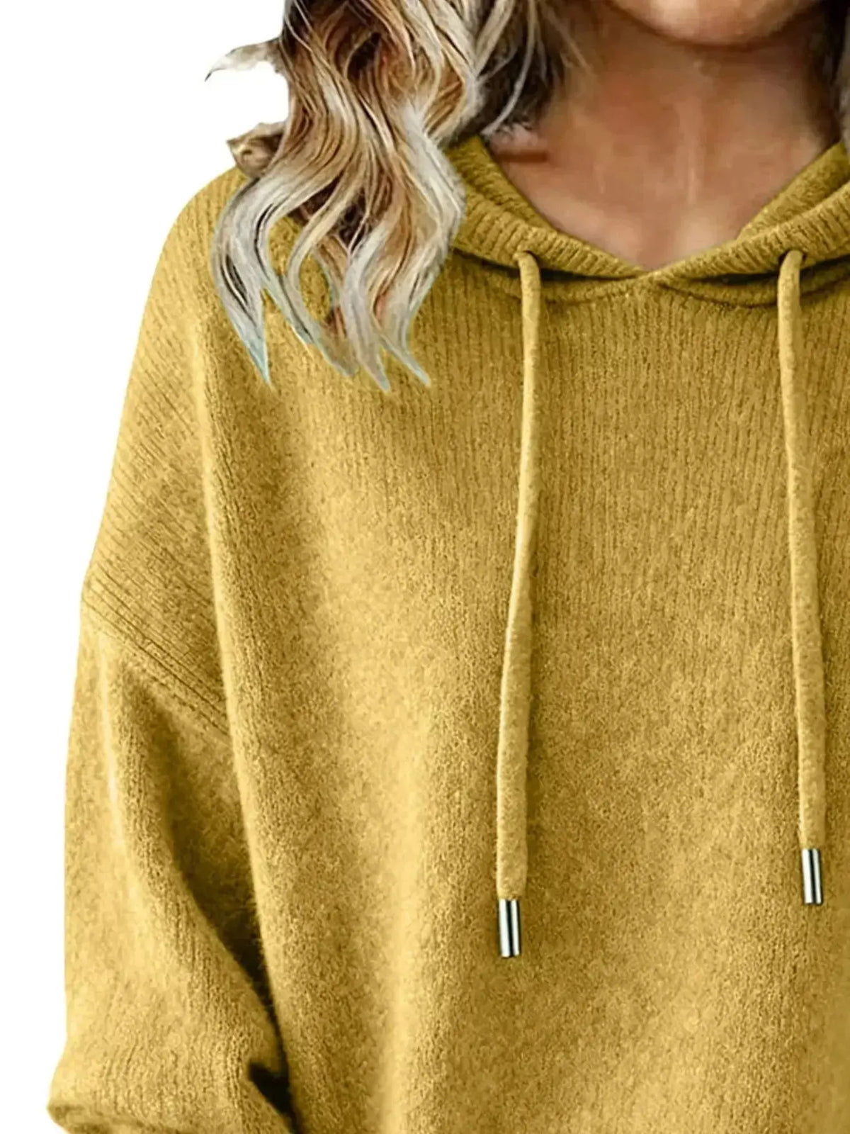Women’s long sleeve drawstring hooded sweater by Plush Fashion Hub, cozy casual pullover with a relaxed fit and sporty style.