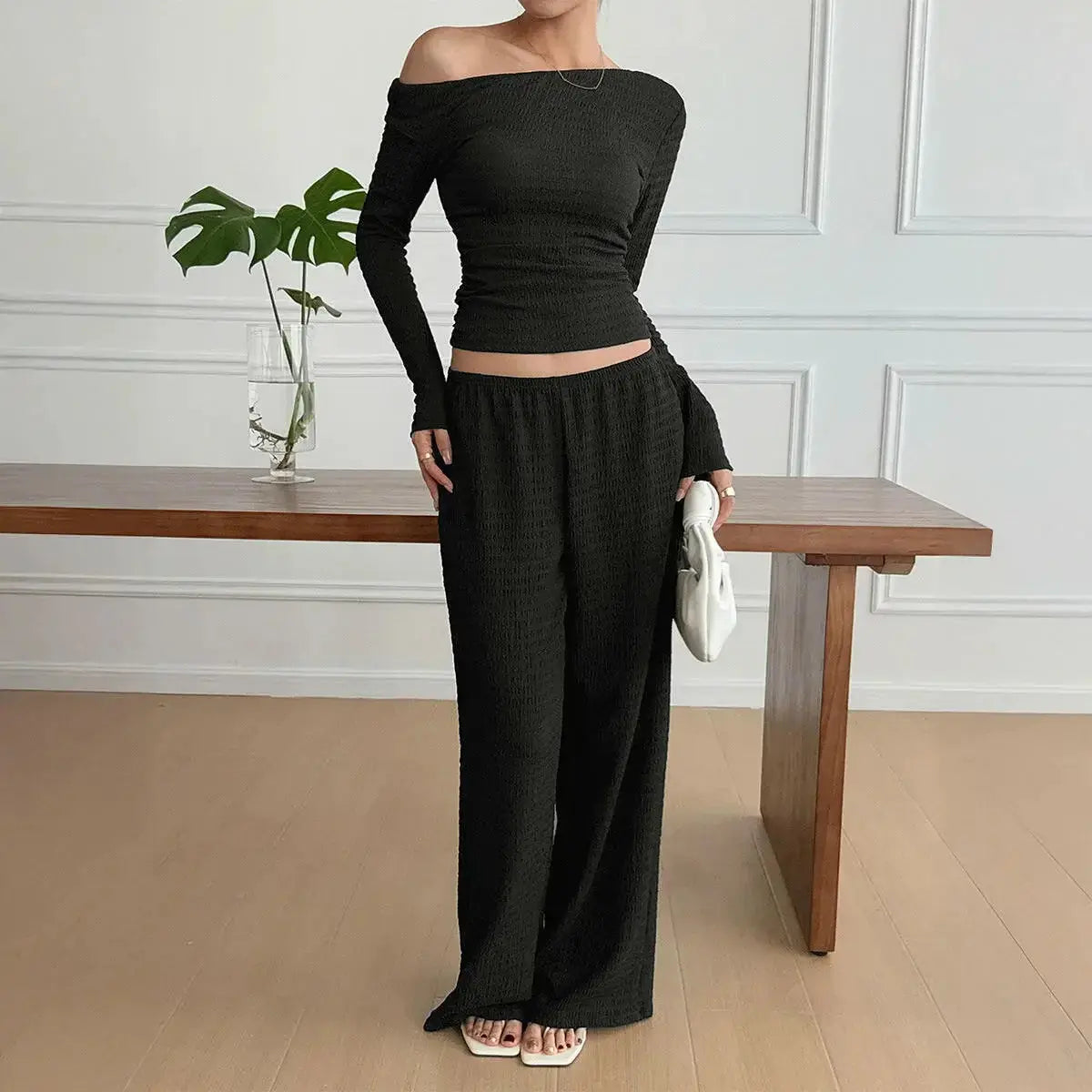 Women’s long sleeve knit two-piece lounge set from Plush Fashion Hub, featuring comfortable pants and a cozy top.