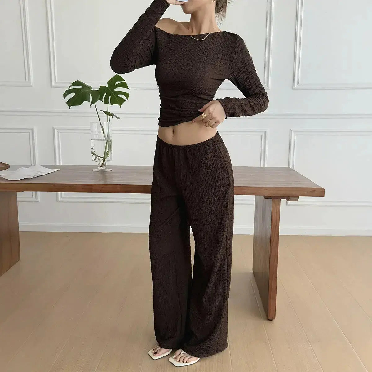 Women’s long sleeve knit two-piece lounge set by Plush Fashion Hub, featuring comfortable pants and top in a cozy, sophisticated style.