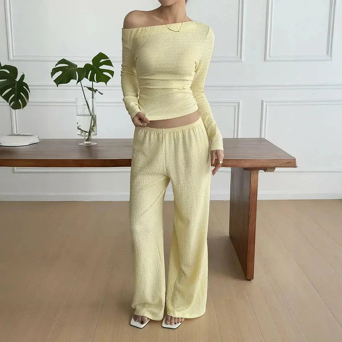 Women’s long sleeve knit two-piece lounge set by Plush Fashion Hub, featuring cozy pants and a matching top.