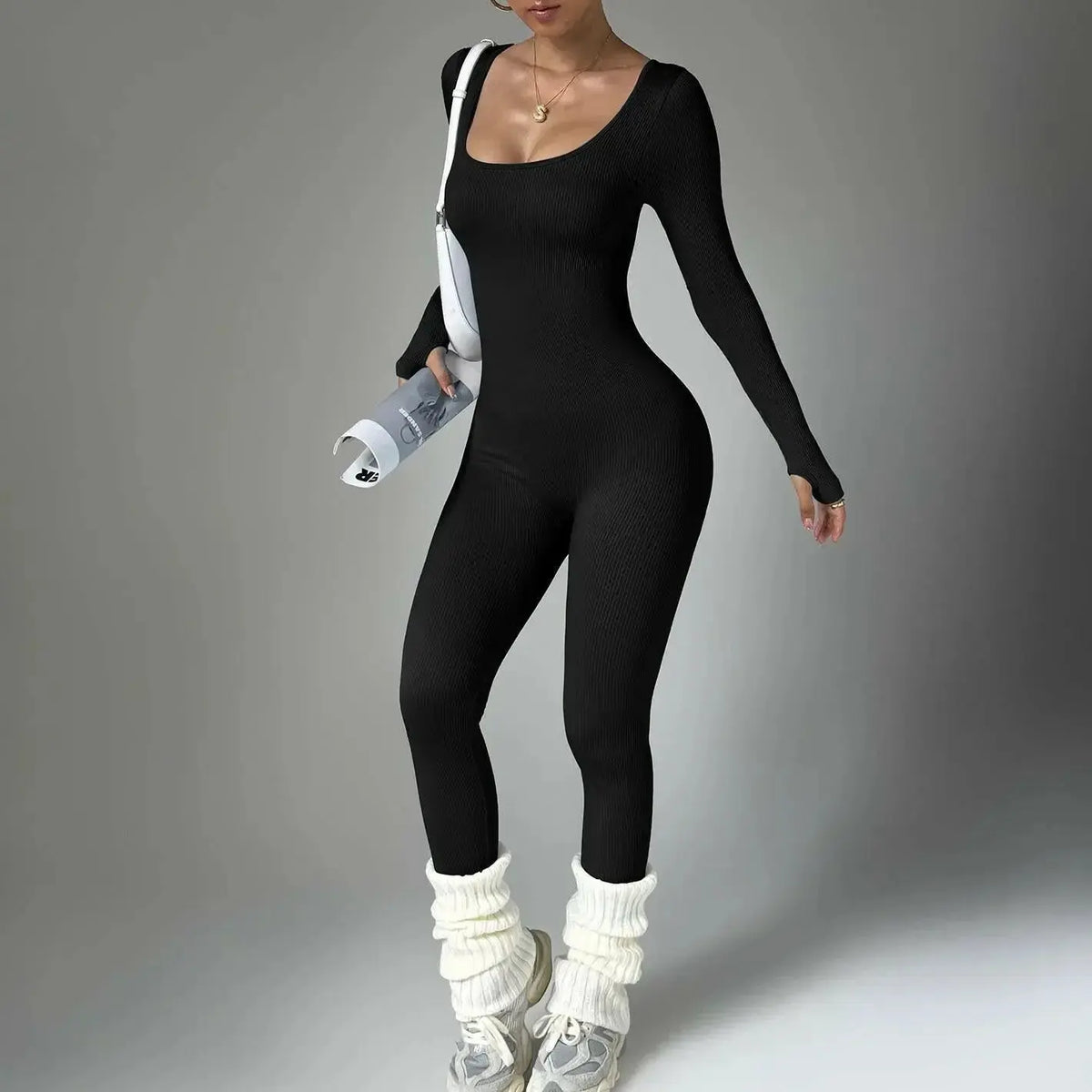 Women wearing Plush Fashion Hub long sleeve compression yoga suit, quick-dry fitness set for yoga and workout sessions.