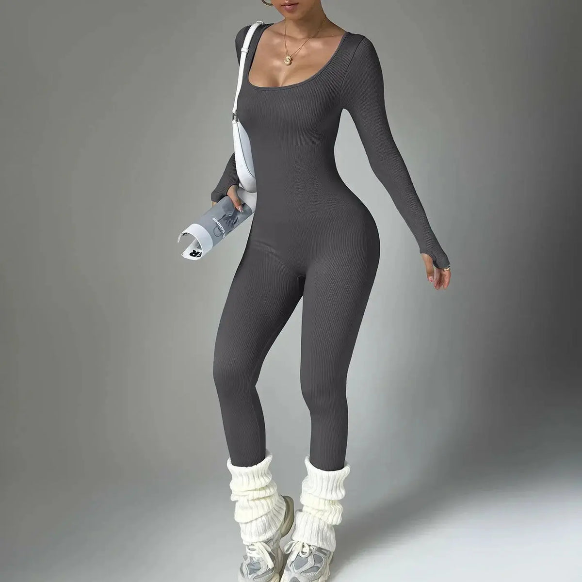 Women wearing Plush Fashion Hub long sleeve compression yoga suit, quick-dry fitness outfit for workout and yoga sessions.