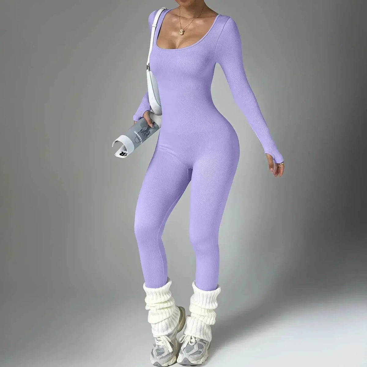 Women in Plush Fashion Hub long sleeve compression yoga suit, quick-dry fitness set, ideal for yoga and active workouts.