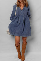 Women's long sleeve denim mini dress with tie neck, soft cotton fabric, casual style by Trendsi.