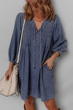 Women's long sleeve denim mini dress with tie neck, soft cotton material, casual style, by Trendsi.