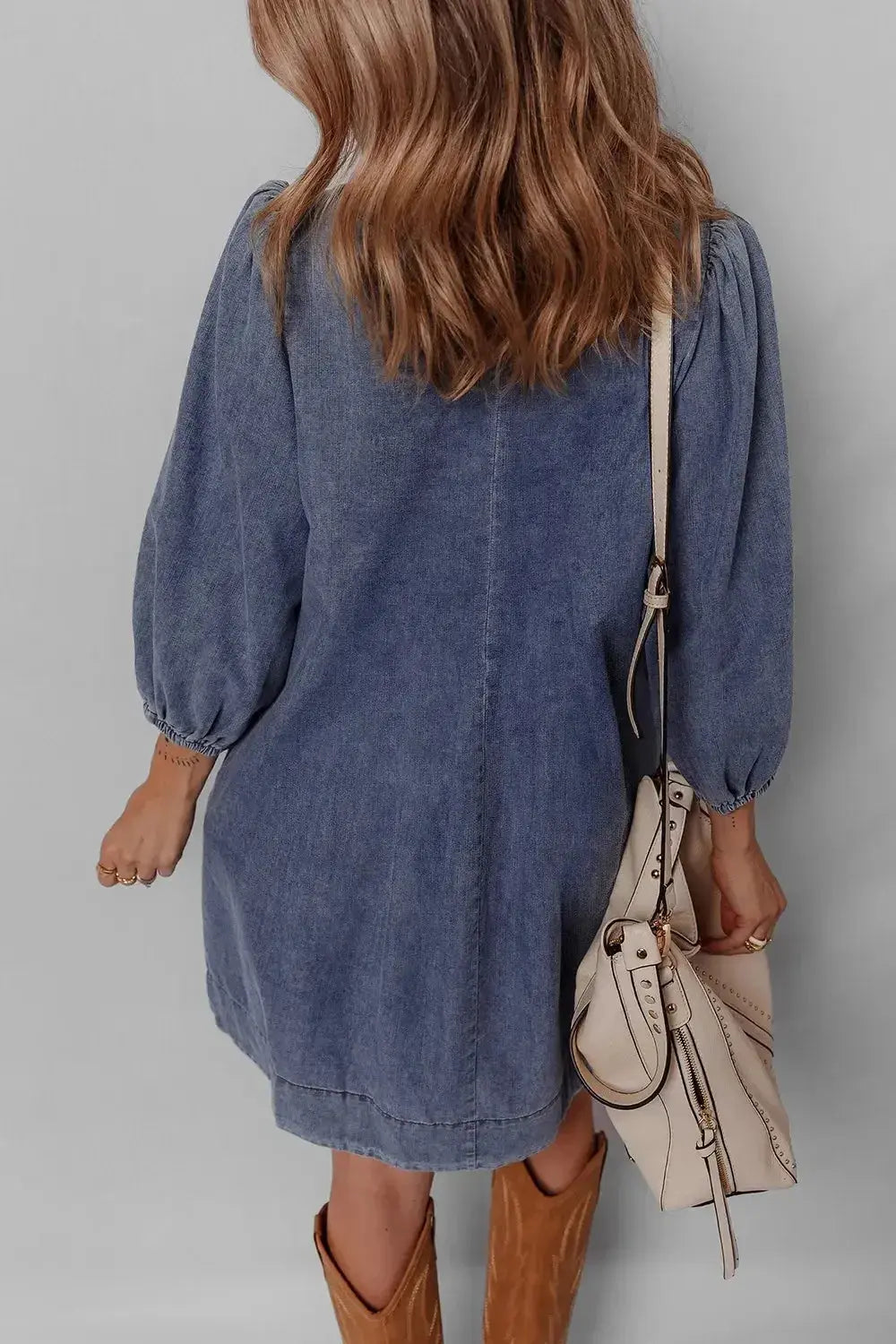 Women's long sleeve tie neck denim mini dress by Trendsi, made of soft cotton with casual style, perfect for everyday wear.