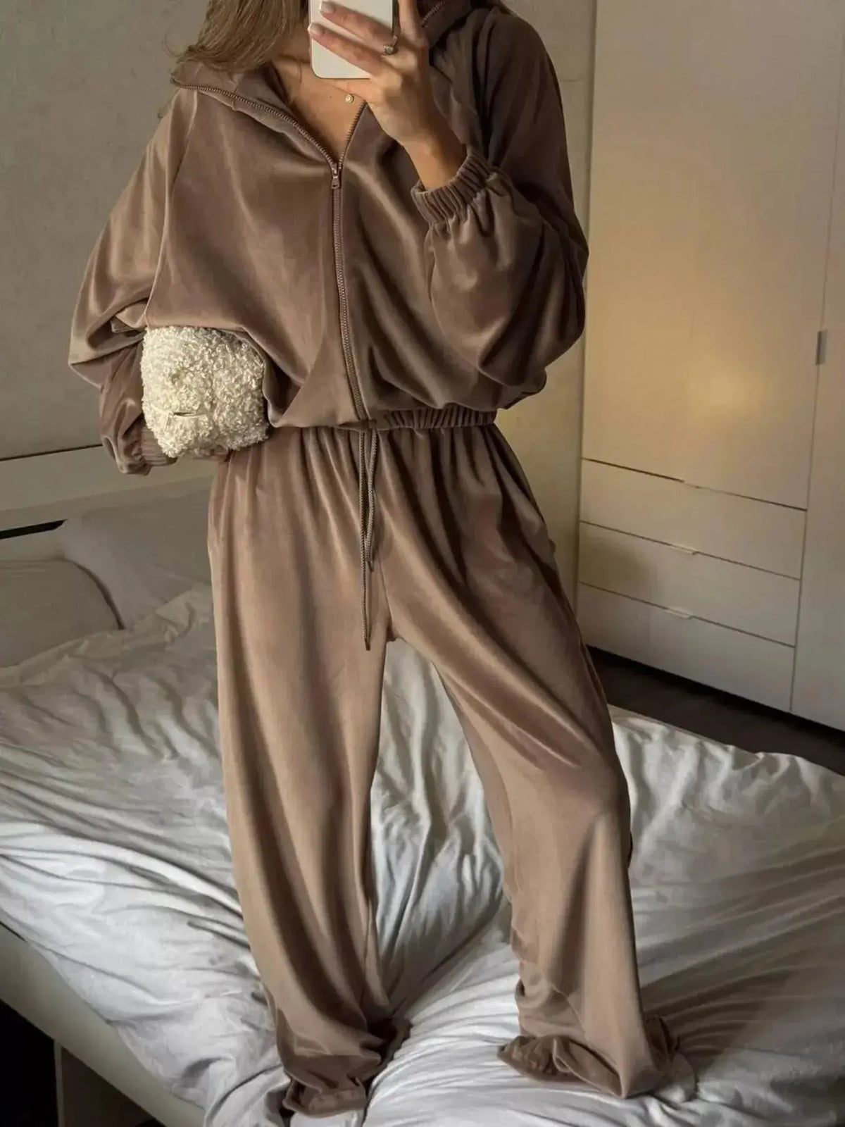 Women’s long sleeve zip-up jacket and pants lounge set by Plush Fashion Hub, comfortable and stylish for casual wear.