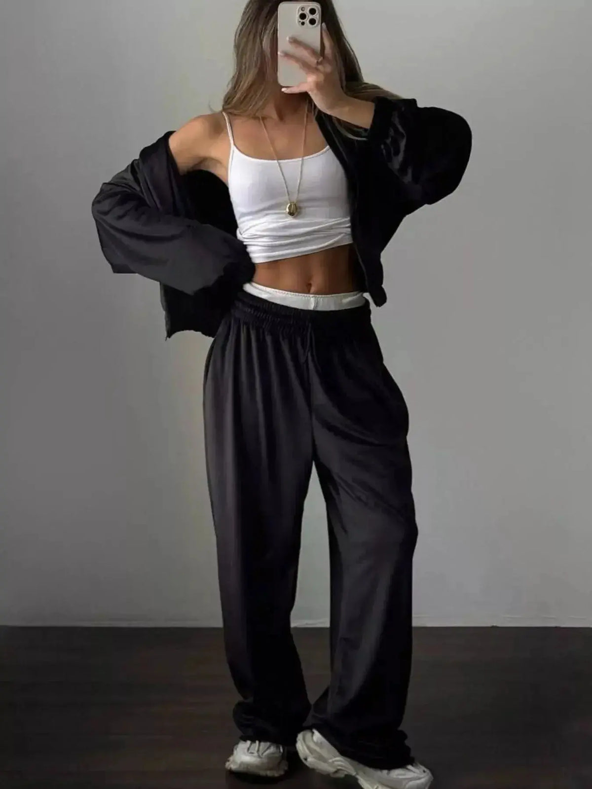 Women’s long sleeve zip-up jacket and pants lounge set by Plush Fashion Hub, soft and comfortable for casual wear.