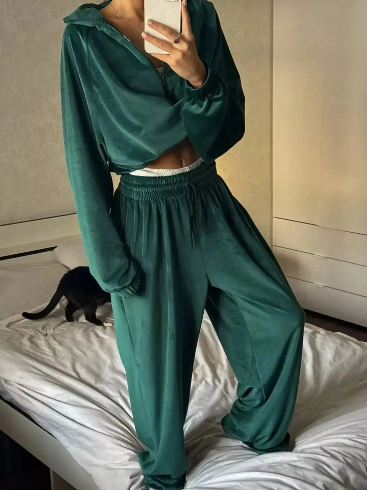 Women’s long sleeve zip-up jacket and pants lounge set by Plush Fashion Hub, cozy and stylish for relaxed wear.