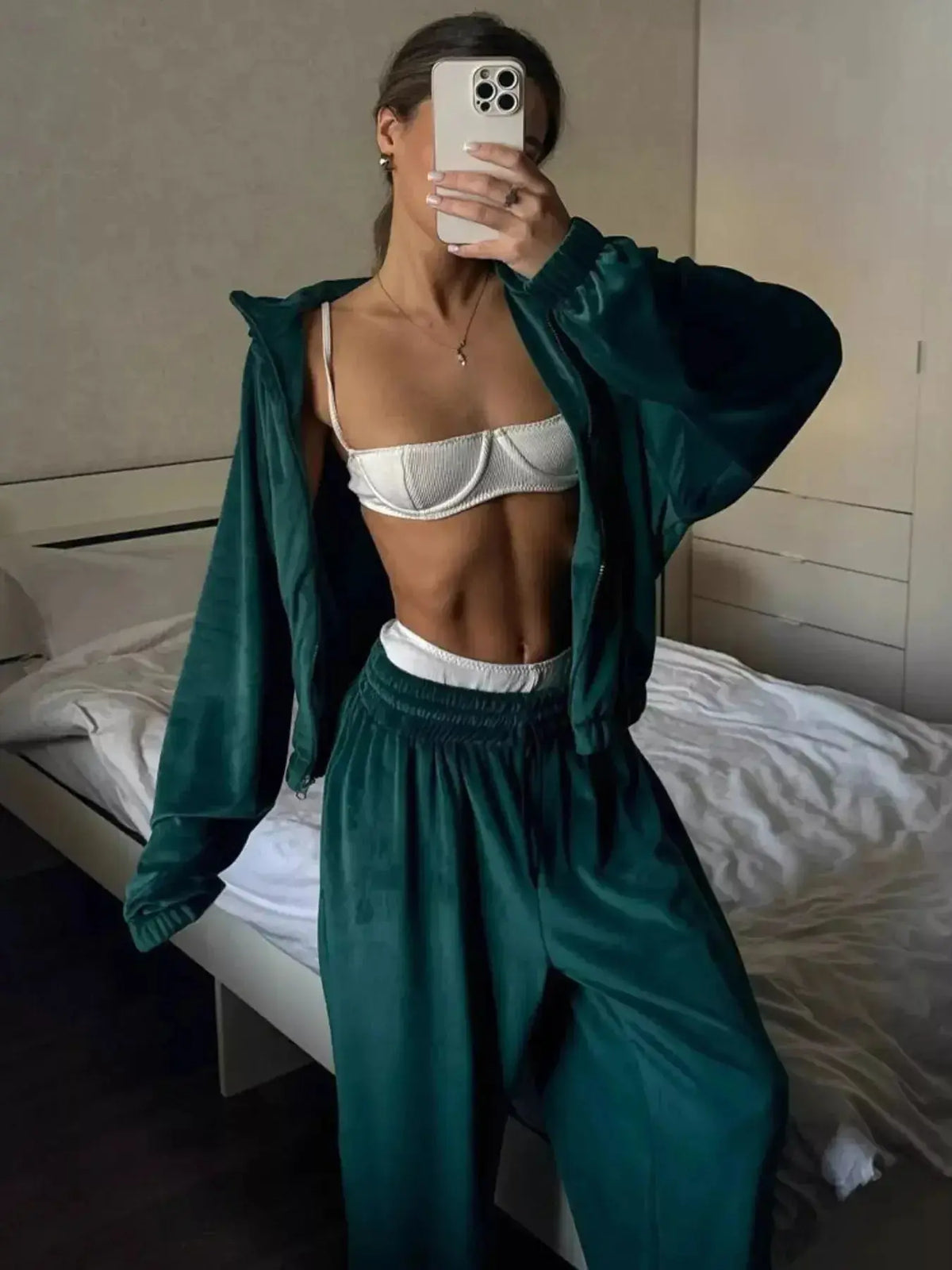Women’s long sleeve zip-up jacket and matching pants lounge set by Plush Fashion Hub, casual and comfortable activewear.