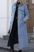 Women's longline denim jacket with button-front closure, structured cotton blend outerwear, casual and stylish by Trendsi.