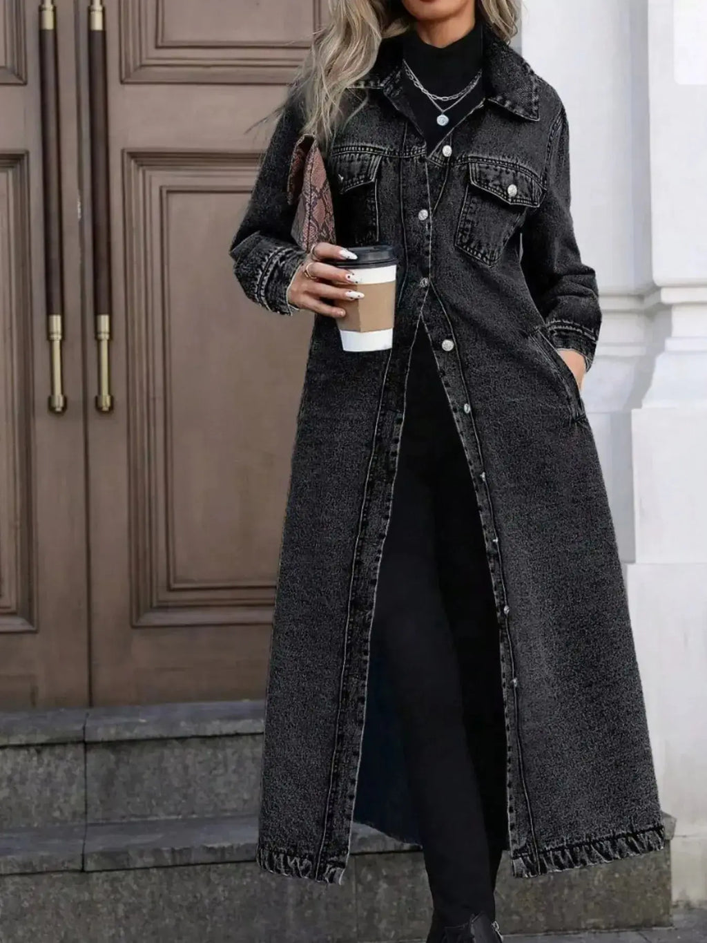 Women's longline denim jacket with button-front closure, structured cotton blend outerwear, stylish and versatile for casual wear.
