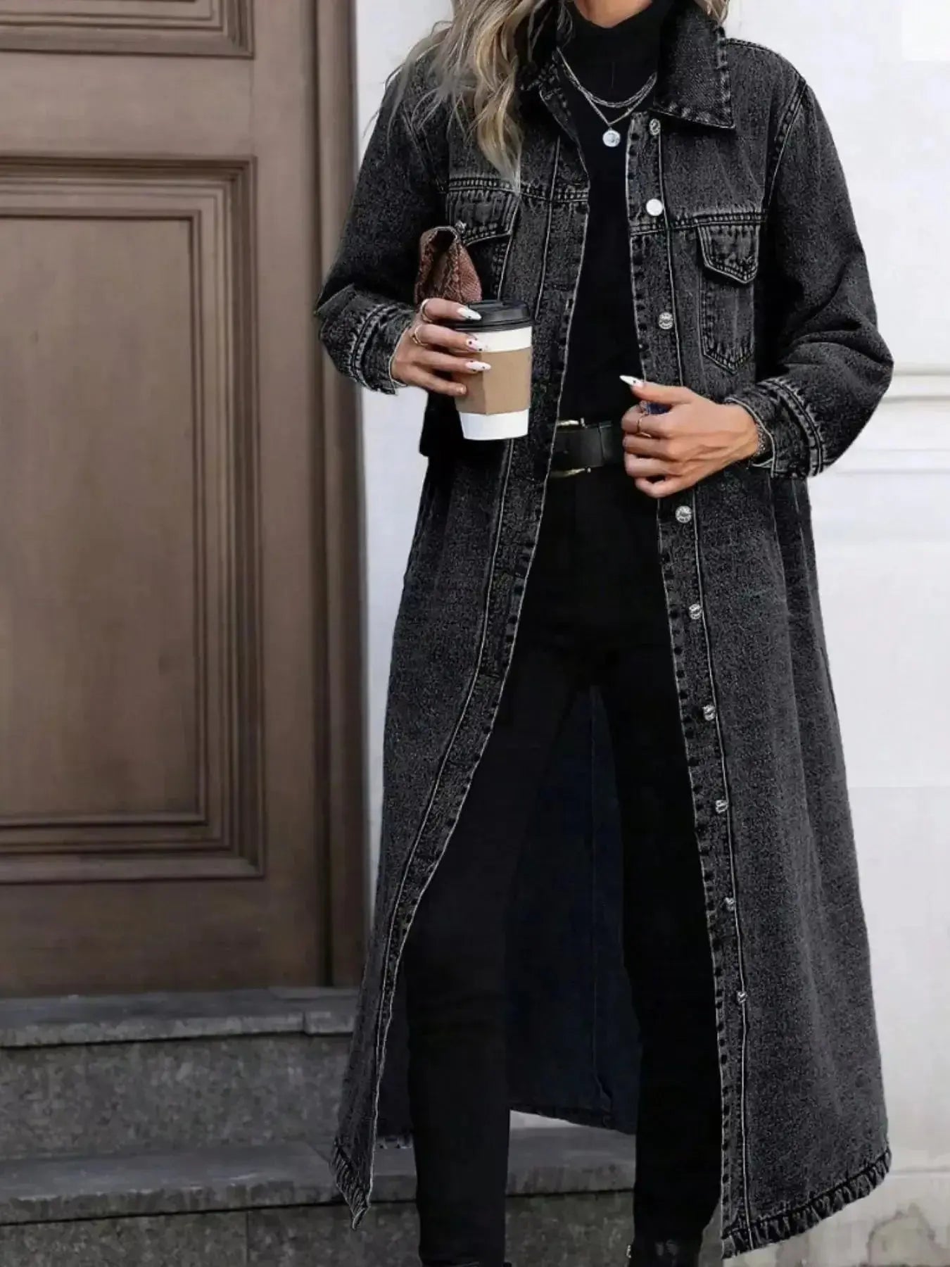 Women's longline denim jacket with button-front closure, structured cotton blend outerwear, stylish and versatile by Trendsi.