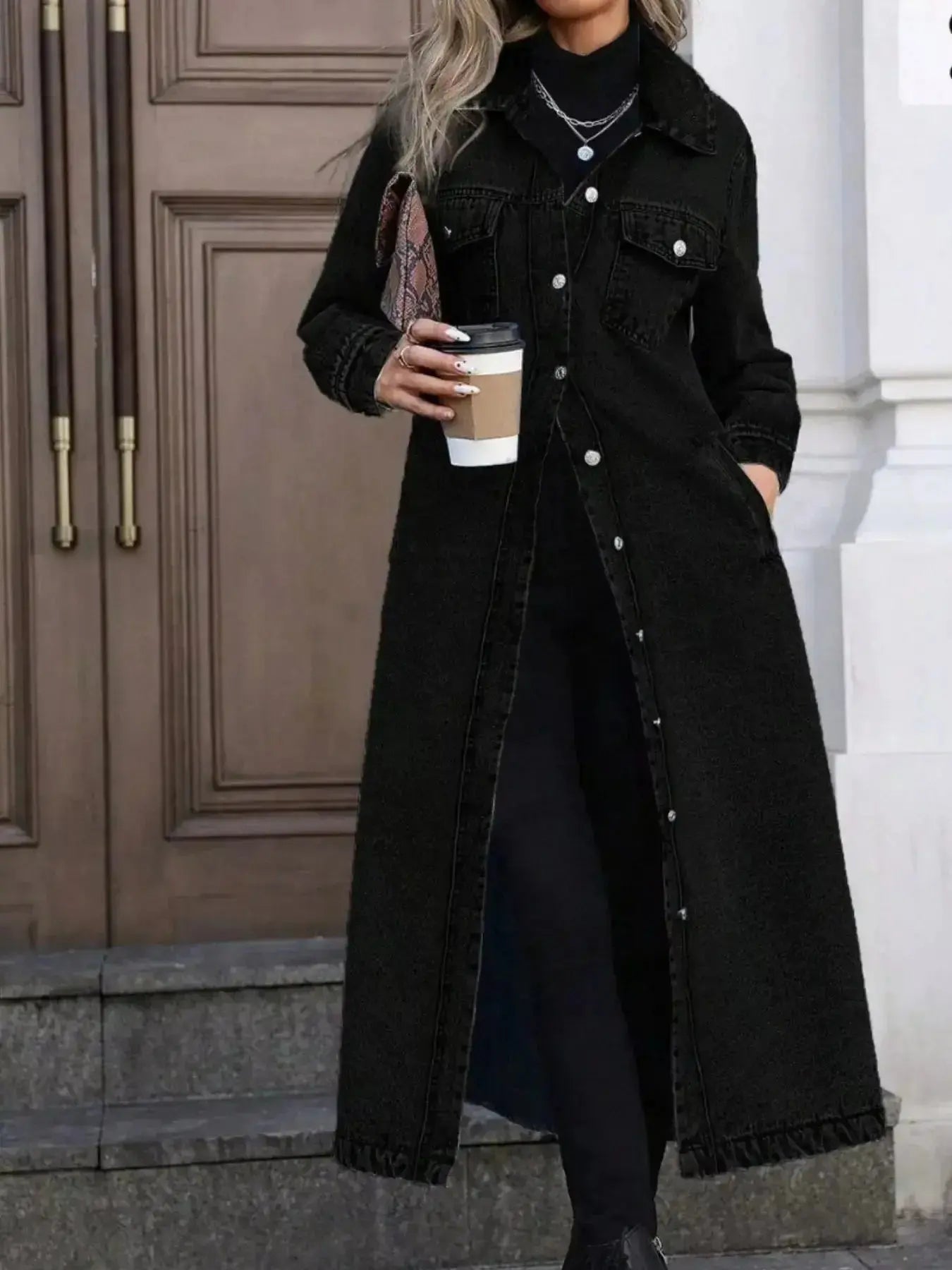 Women’s longline denim jacket with button-front closure, structured cotton blend outerwear, stylish and versatile for casual wear.