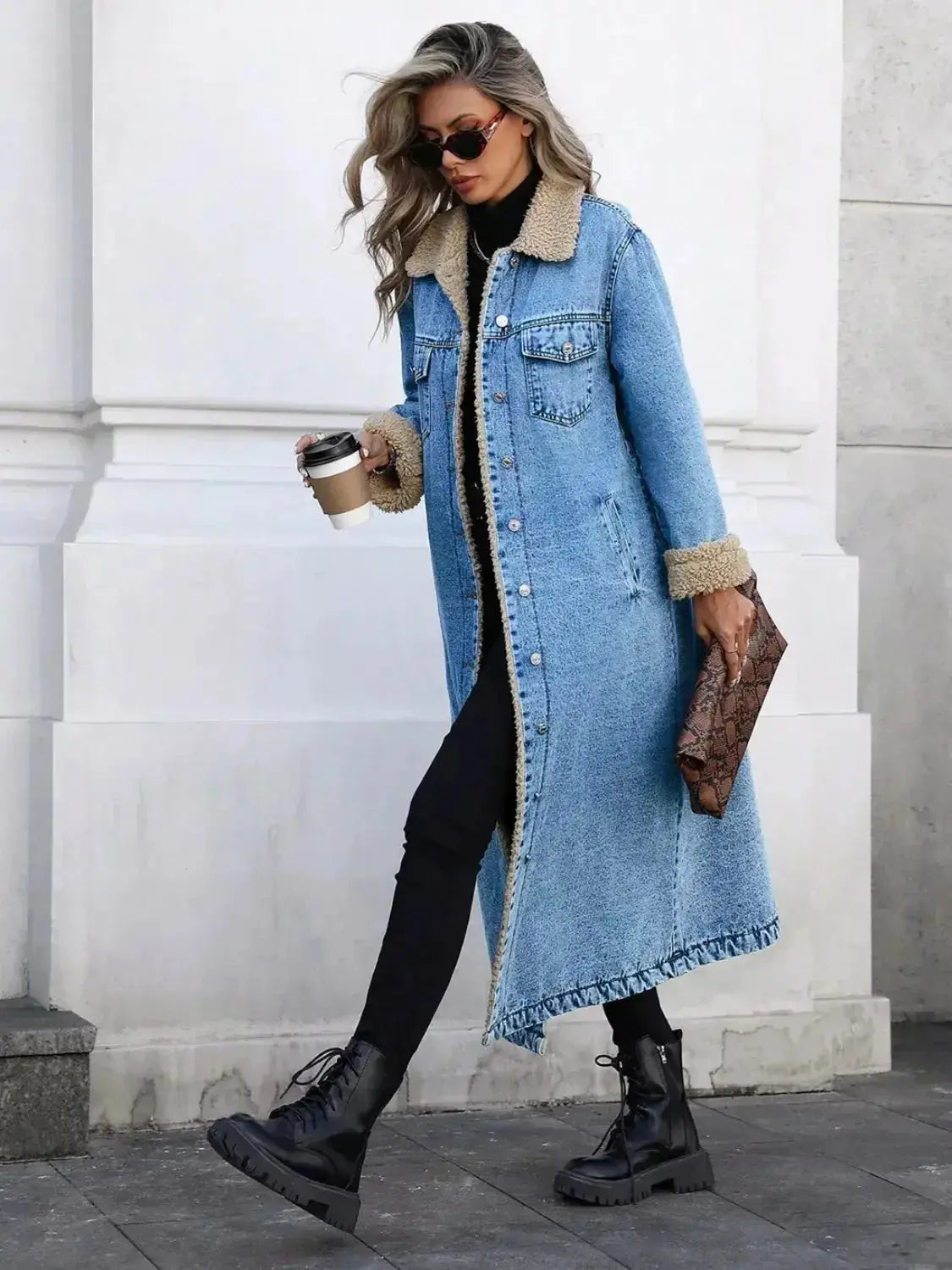 Women’s longline denim jacket with cozy sherpa lining, stylish fall and winter outerwear by Plush Fashion Hub.