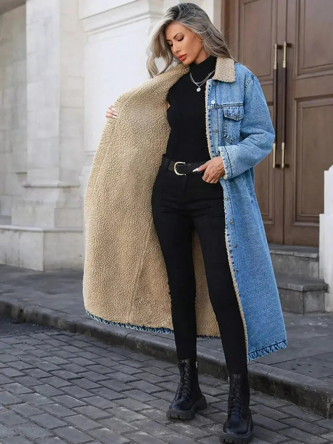 Women's longline denim jacket by Plush Fashion Hub with cozy sherpa lining, perfect for fall and winter outerwear.
