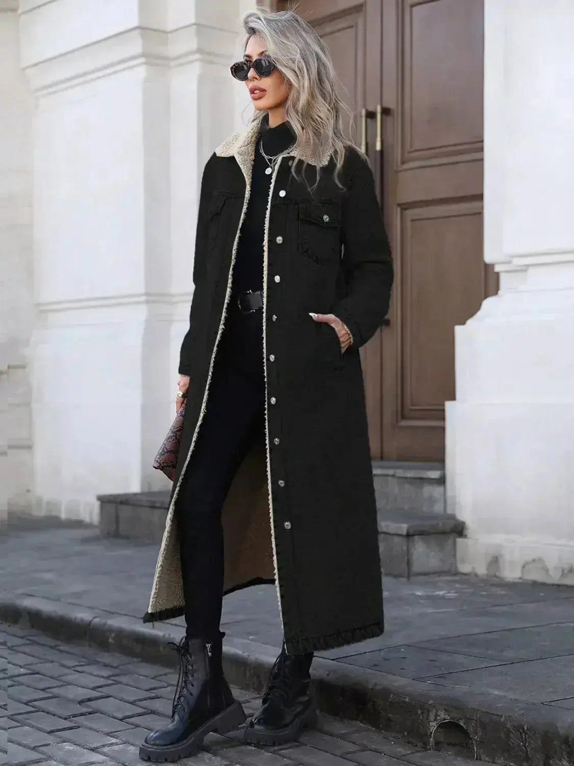 Women’s longline denim jacket with sherpa lining, cozy fall and winter outerwear by Plush Fashion Hub.