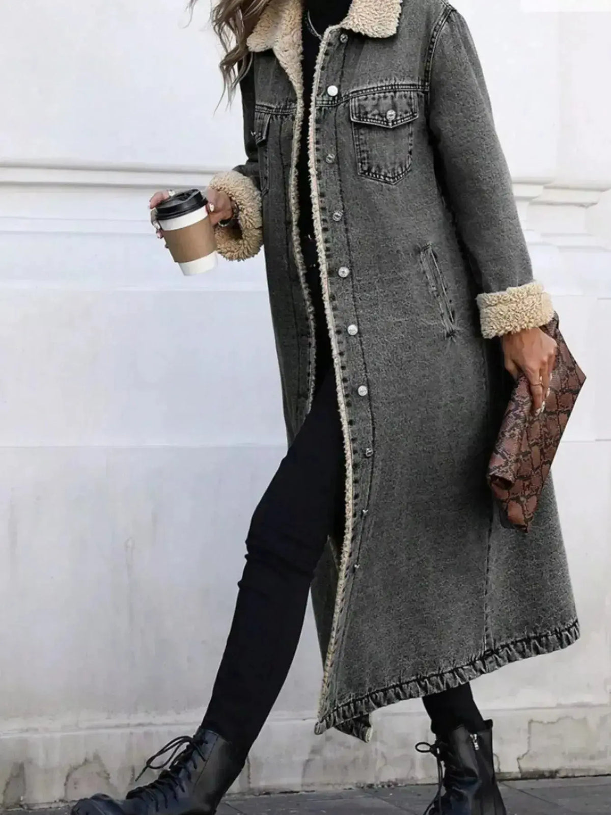 Women’s longline denim jacket with plush sherpa lining, cozy fall and winter outerwear by Plush Fashion Hub.