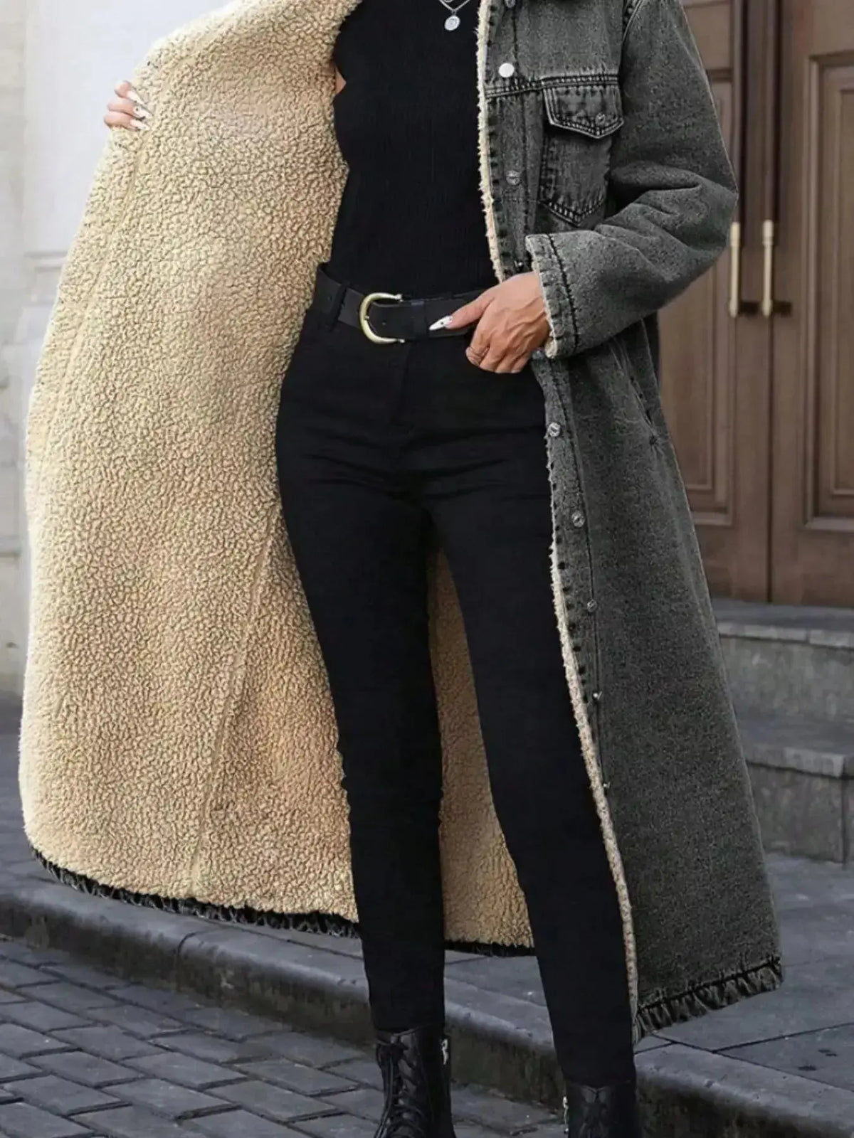 Women’s longline denim jacket with plush sherpa lining, cozy fall and winter outerwear by Plush Fashion Hub.