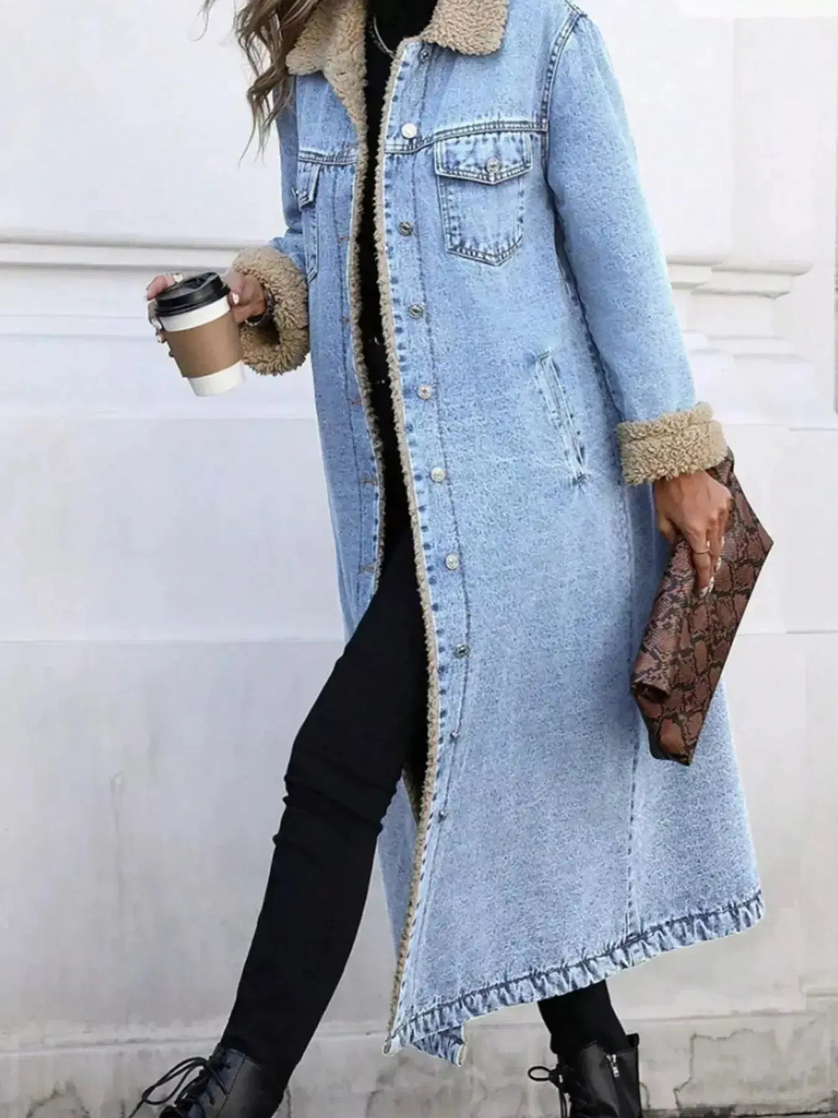 Women’s longline denim jacket with sherpa lining, cozy fall and winter outerwear by Plush Fashion Hub.