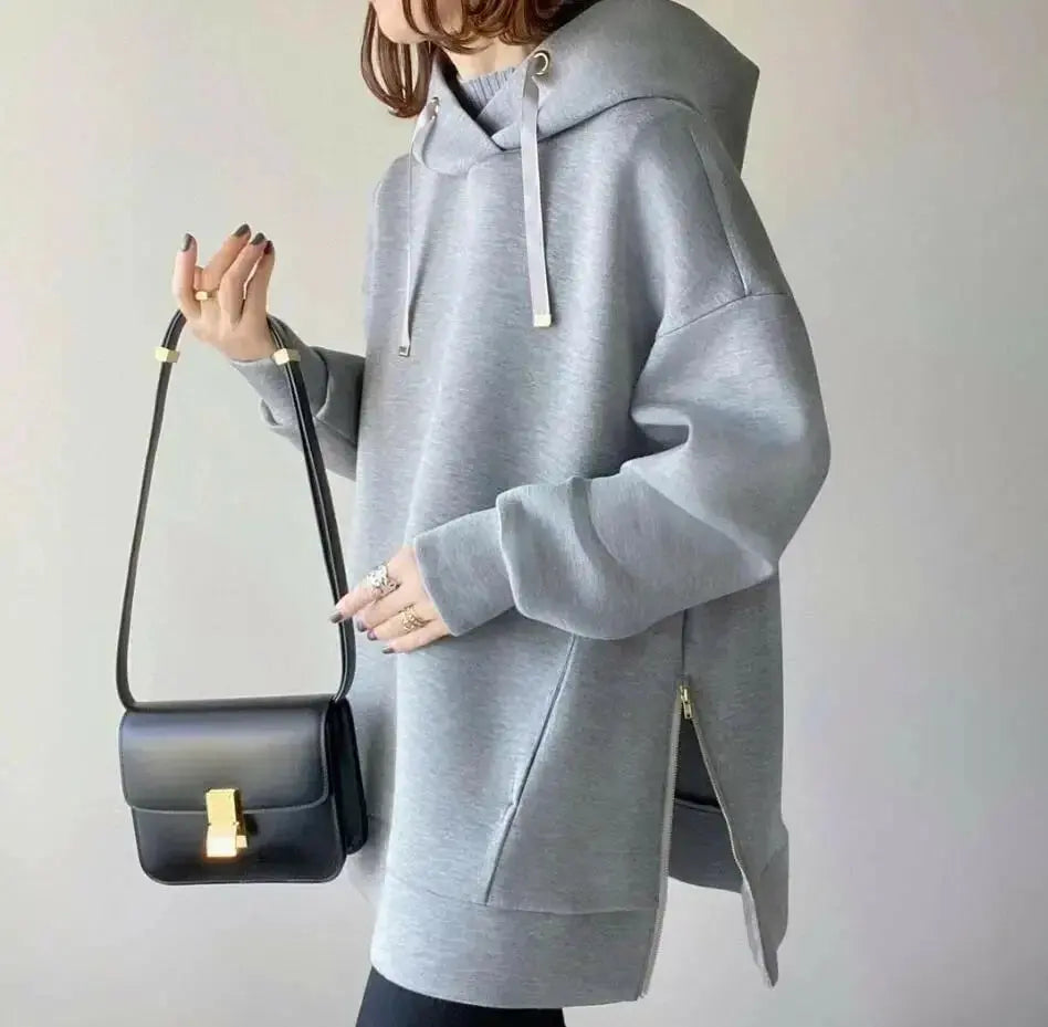 Women’s relaxed fit hooded knit sweater with side zipper in solid color, by Plush Fashion Hub, featuring a comfortable, casual style.