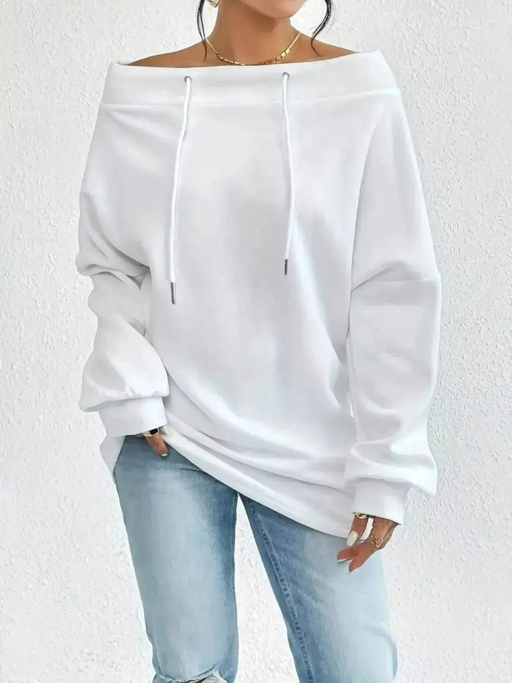 Women's off-shoulder long sleeve drawstring sweatshirt by Trendsi, featuring plush fabric and casual off-shoulder style.