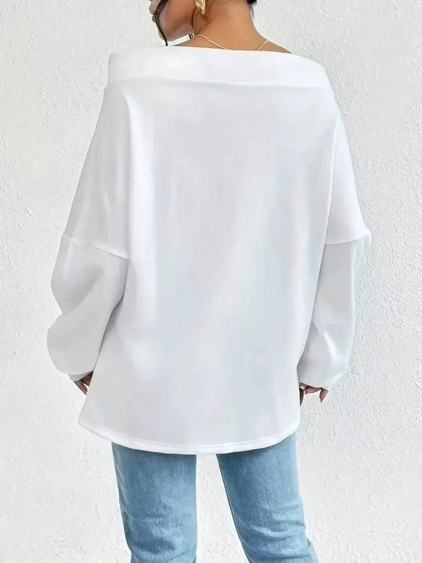 Women's off-shoulder long sleeve sweatshirt with drawstring details, stylish plush fabric by Trendsi for casual wear.
