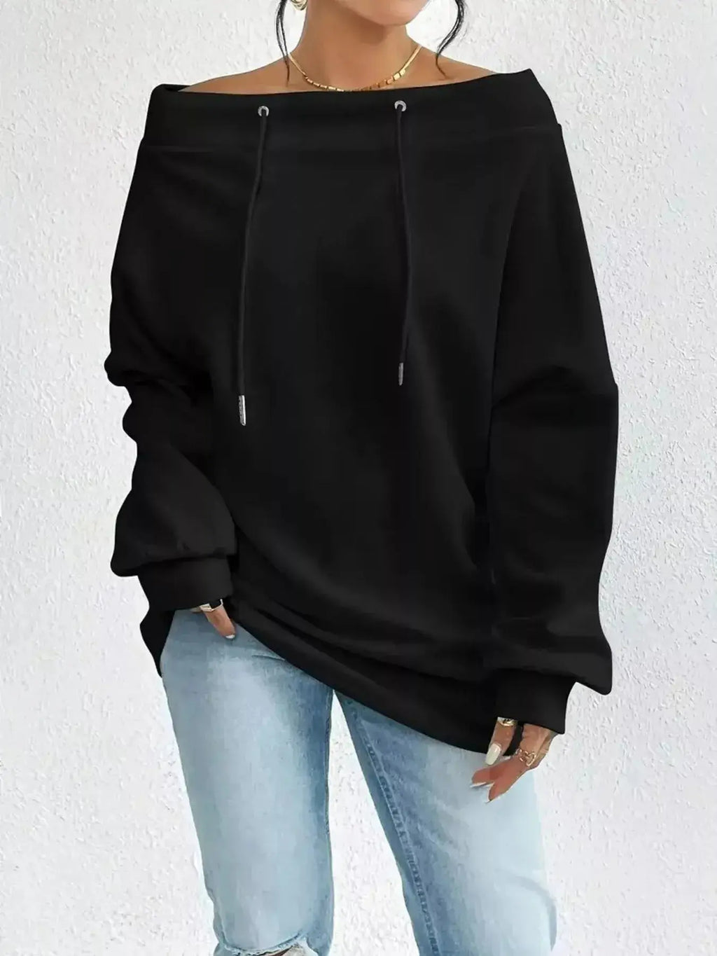 Women's off-shoulder long sleeve drawstring sweatshirt by Trendsi, plush fabric, relaxed fit, stylish casual wear.
