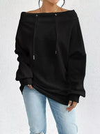 Women's off-shoulder long sleeve drawstring sweatshirt by Trendsi, plush fabric, relaxed fit, stylish casual wear.