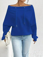 Women's off-shoulder long sleeve drawstring sweatshirt by Trendsi, featuring plush fabric and a relaxed fit for casual wear.