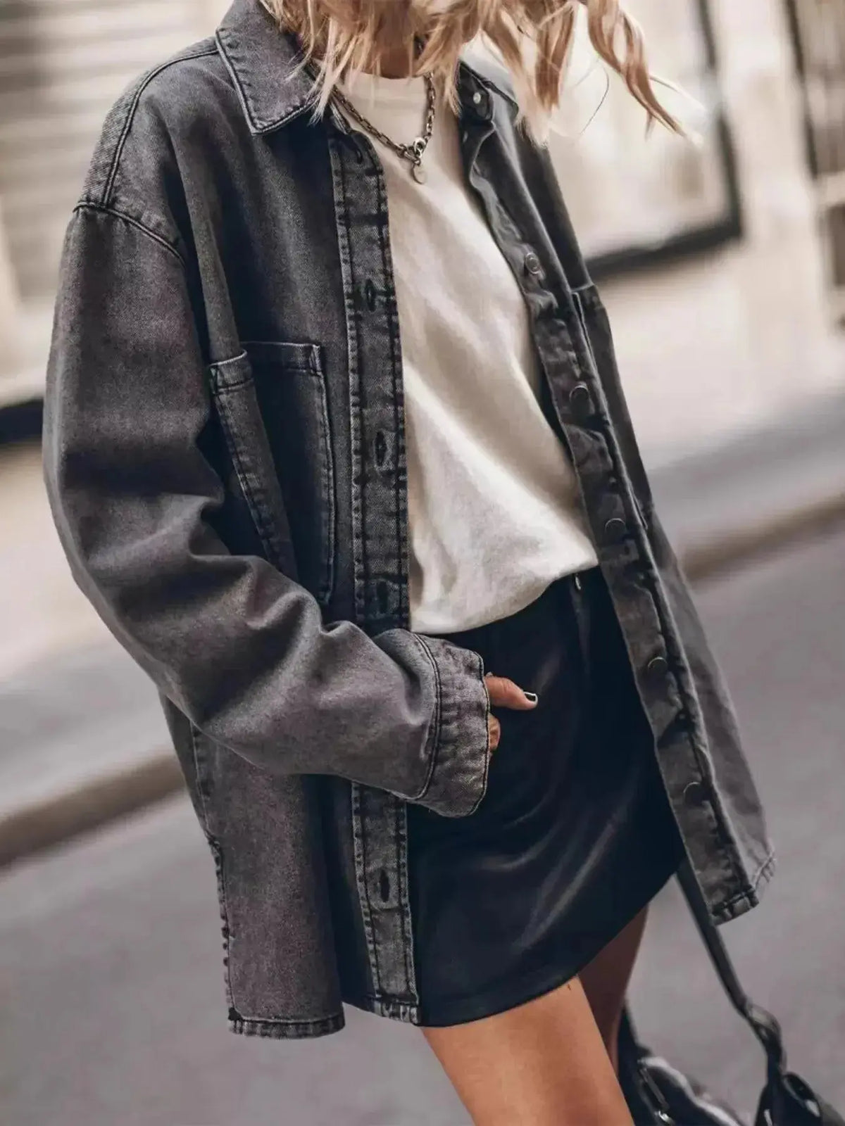 Women wearing an oversized Plush Fashion Hub denim button-up shirt in relaxed fit, casual chic style on a trendy fashion backdrop.