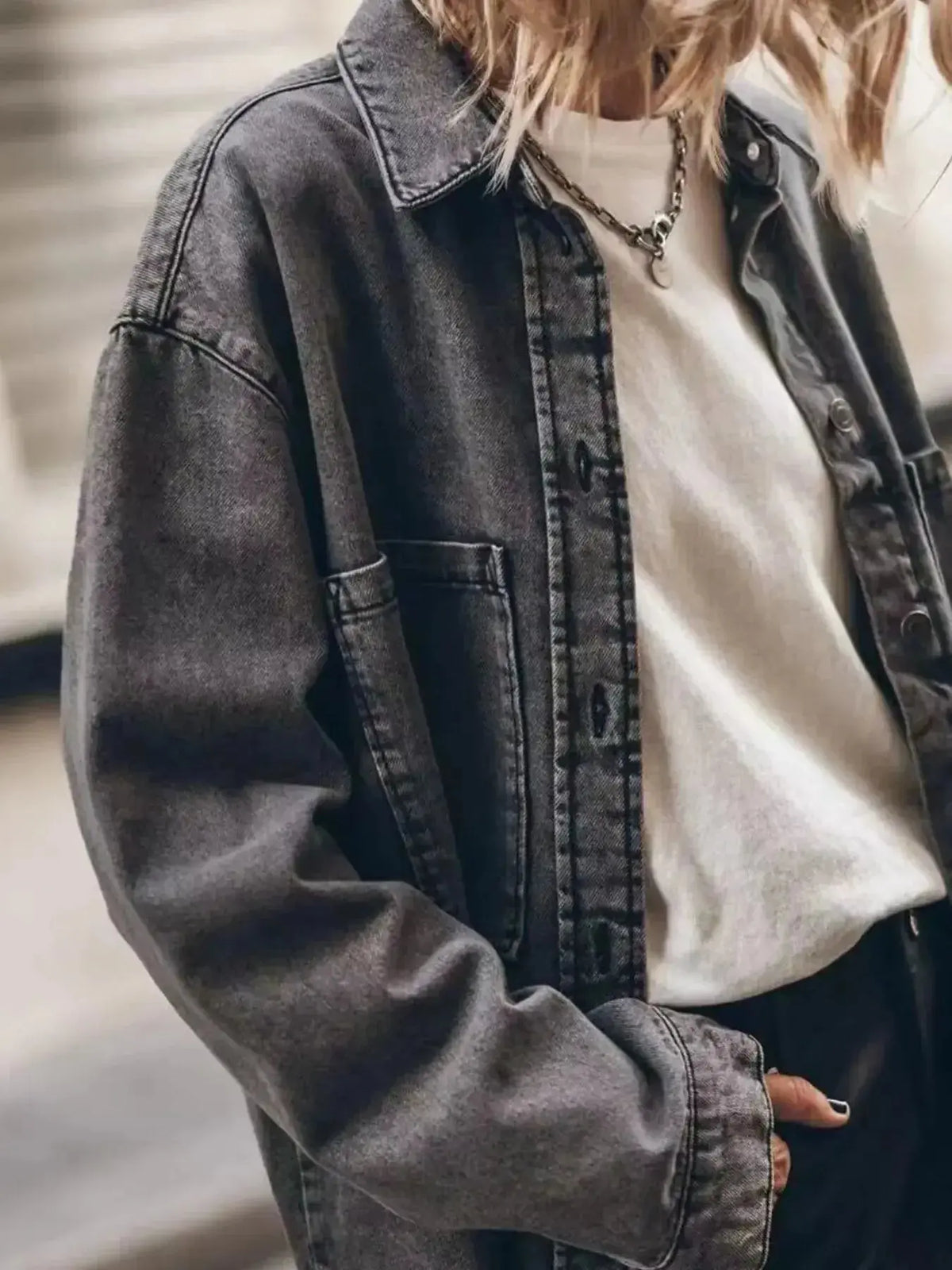 Women wearing Plush Fashion Hub oversized denim shirt with relaxed fit, casual button-up style, and classic denim fabric.