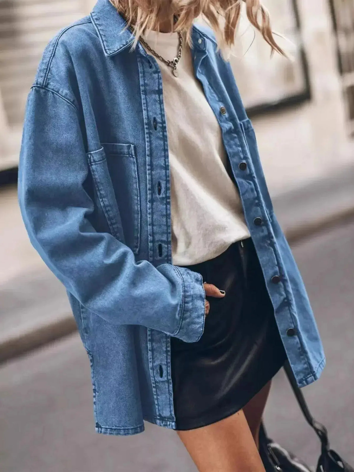 Women wearing a Plush Fashion Hub oversized denim button-up shirt with a relaxed fit, casual style, and trendy look.
