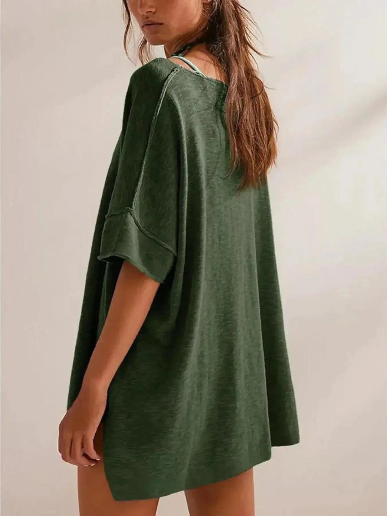 Women’s oversized drop-shoulder round neck T-shirt by Trendsi, relaxed casual fit in soft fabric, styled for comfort and everyday wear.