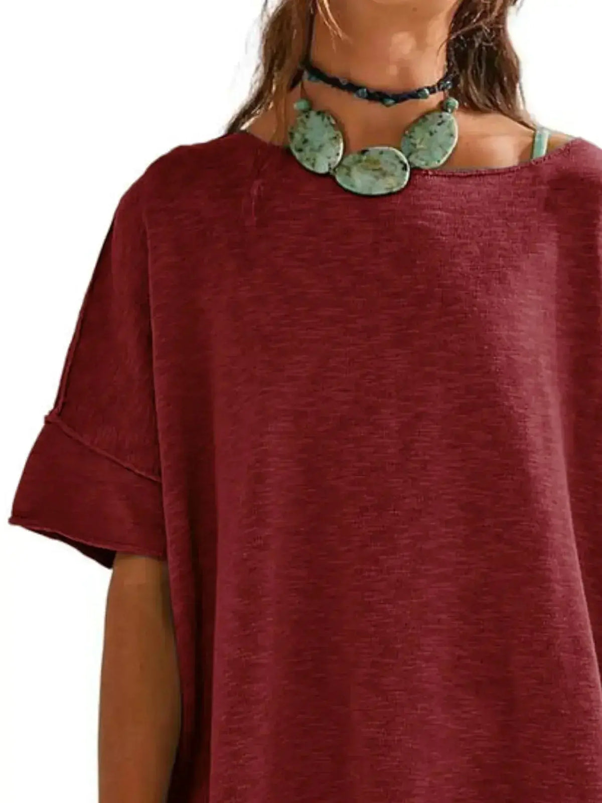 Women’s oversized drop-shoulder round neck casual T-shirt by Plush Fashion Hub, relaxed fit, soft fabric, styled for everyday comfort.