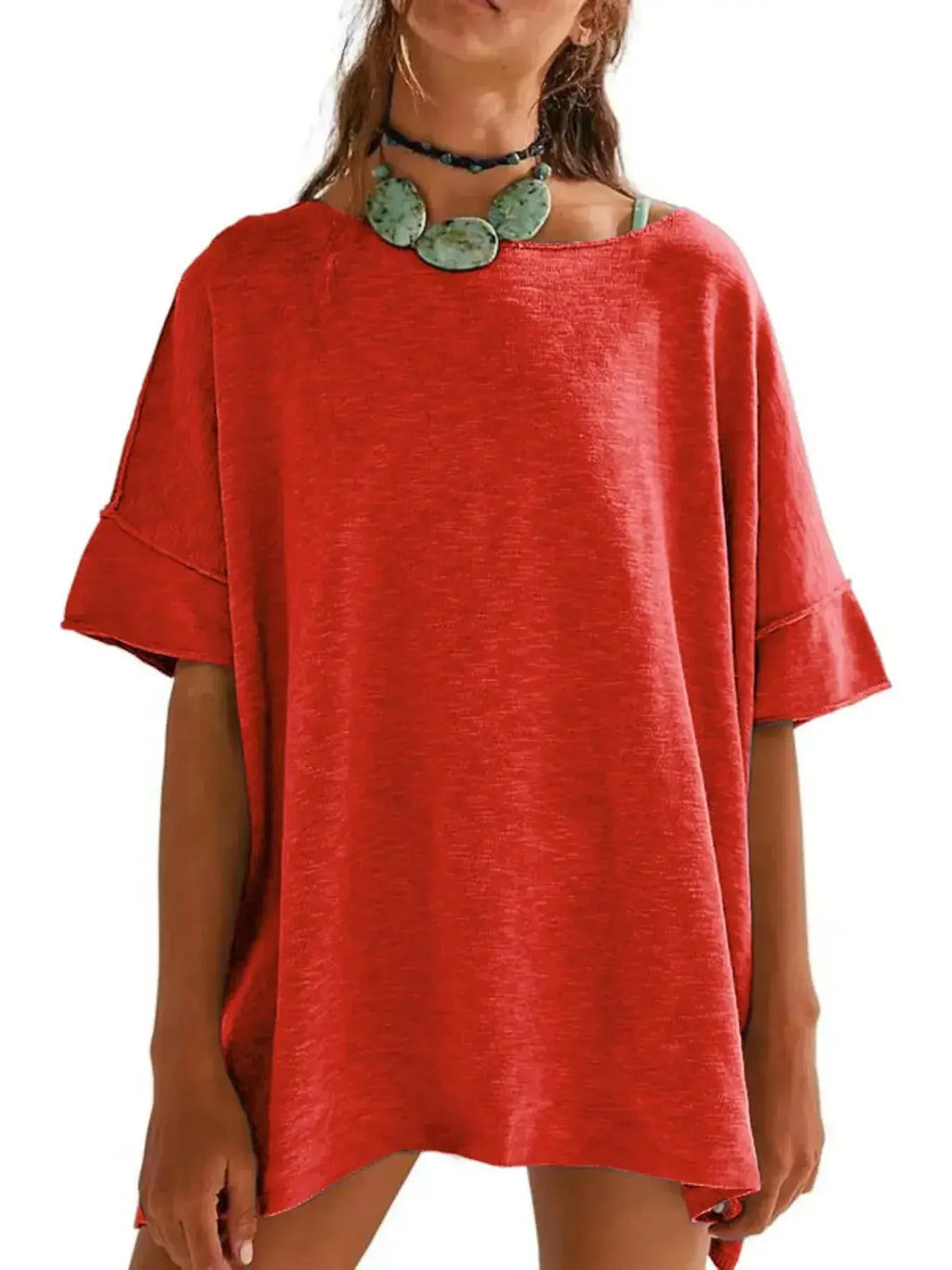 Women’s oversized drop-shoulder round neck T-shirt by Trendsi, featuring a relaxed casual fit and soft fabric for everyday comfort.