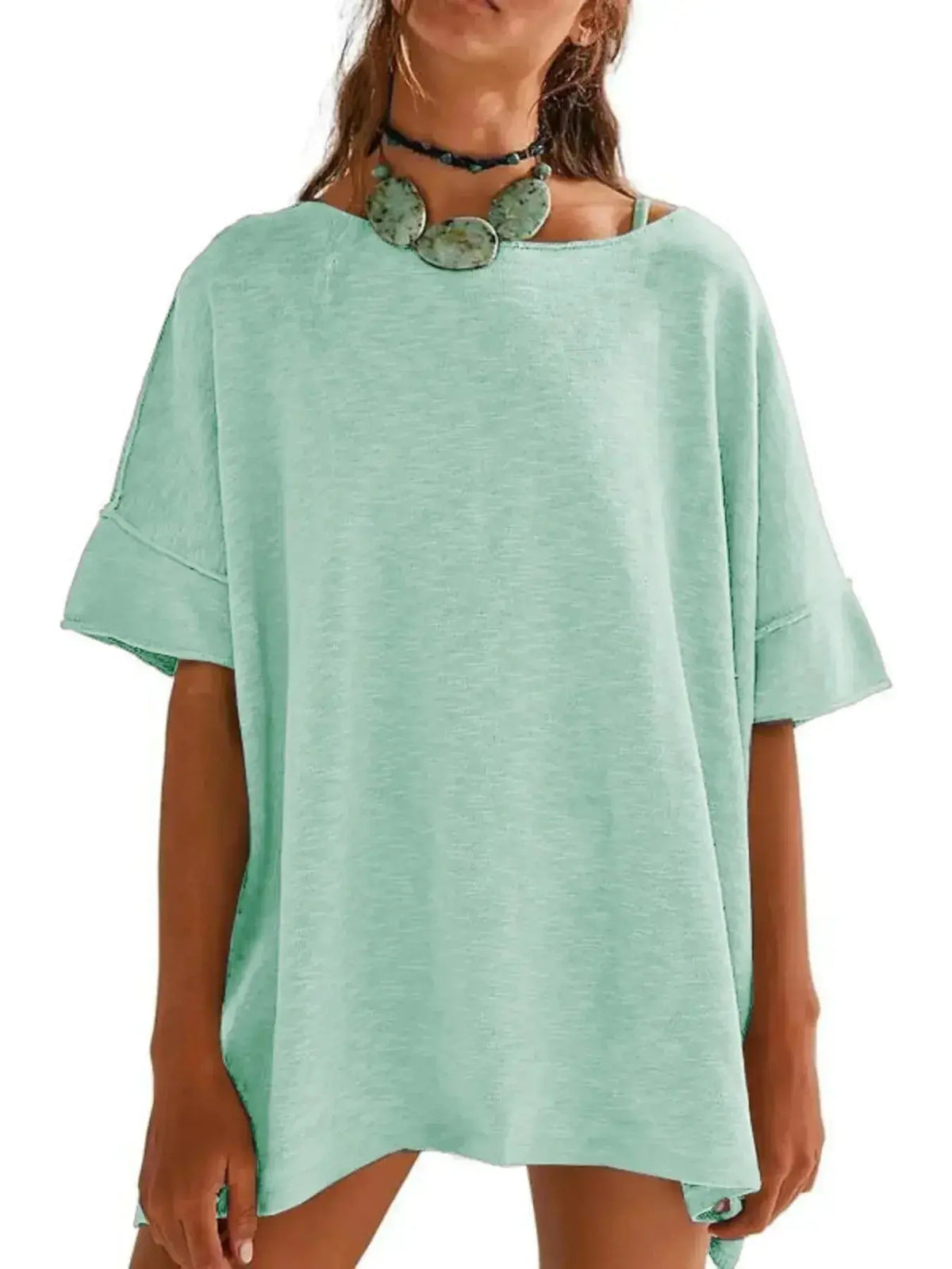 Women’s oversized drop-shoulder round neck casual T-shirt by Plush Fashion Hub, relaxed fit with soft fabric and minimalist style.