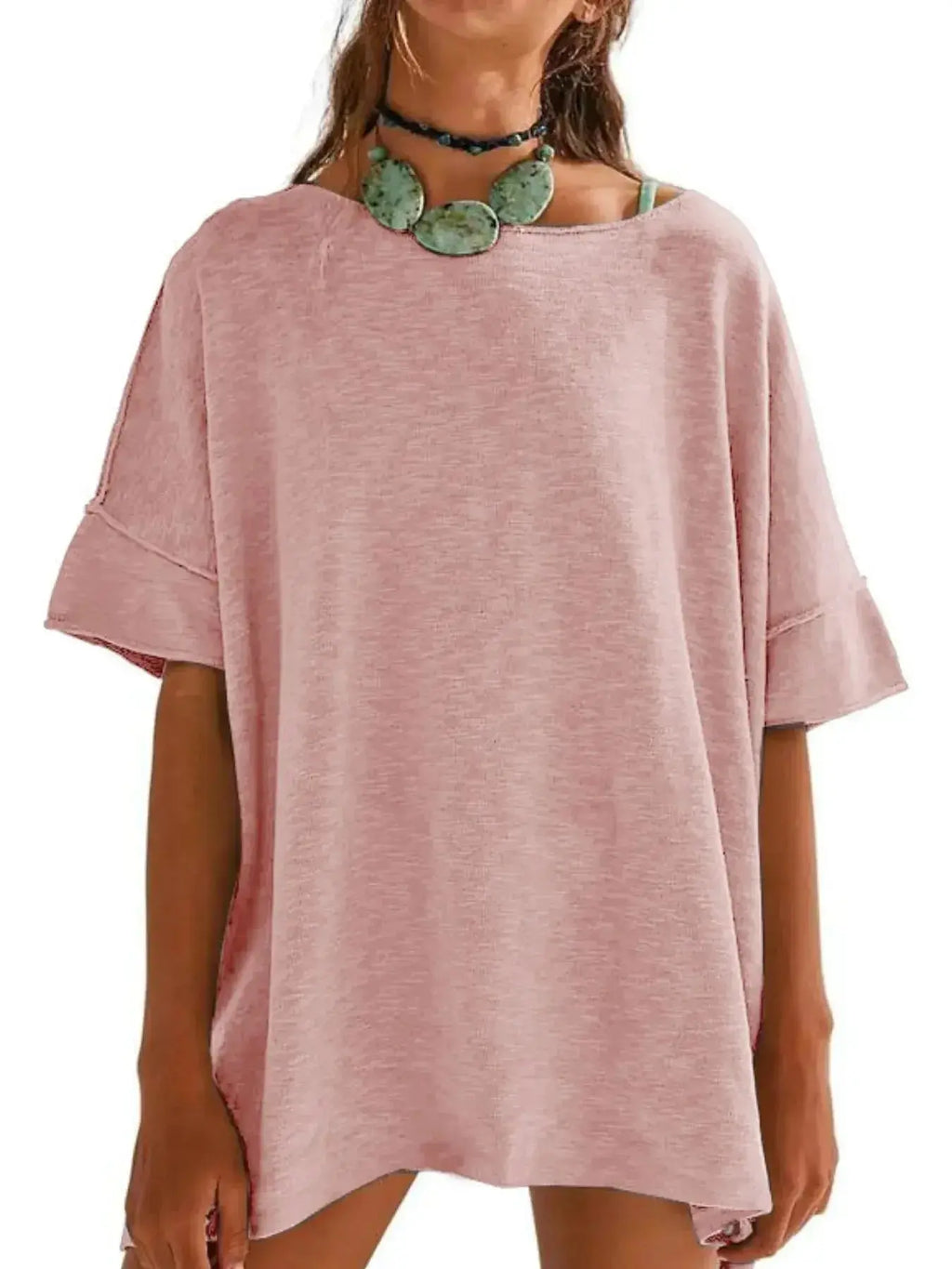 Women’s oversized drop-shoulder round neck casual T-shirt by Trendsi, relaxed fit with soft fabric and relaxed style.