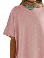 Women's oversized drop-shoulder round neck T-shirt by Trendsi, relaxed casual fit, soft fabric, and versatile style.