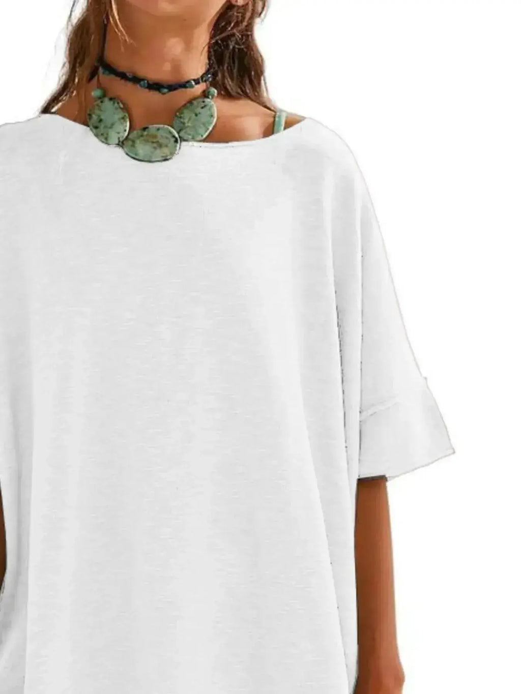 Women's oversized drop-shoulder round neck T-shirt by Trendsi, relaxed casual fit, soft fabric, and stylish design.