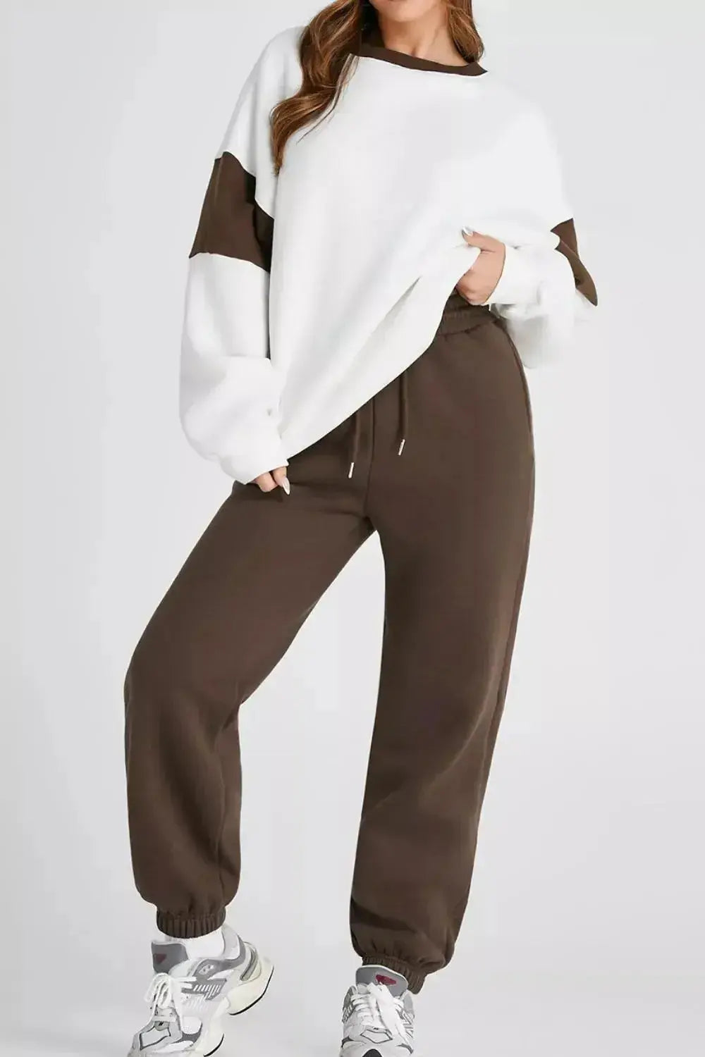Women’s oversized drop shoulder sweatshirt and matching joggers loungewear set by Plush Fashion Hub, casual and comfortable for relaxed wear.